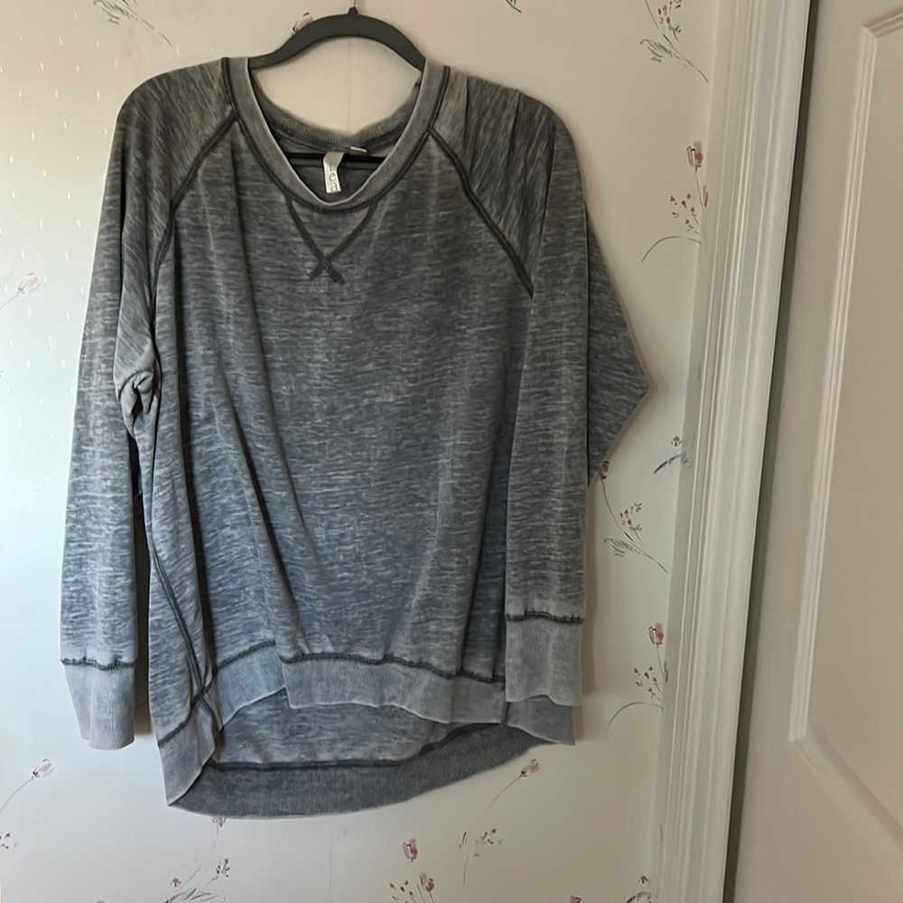 Long sleeve lightweight gray shirt.